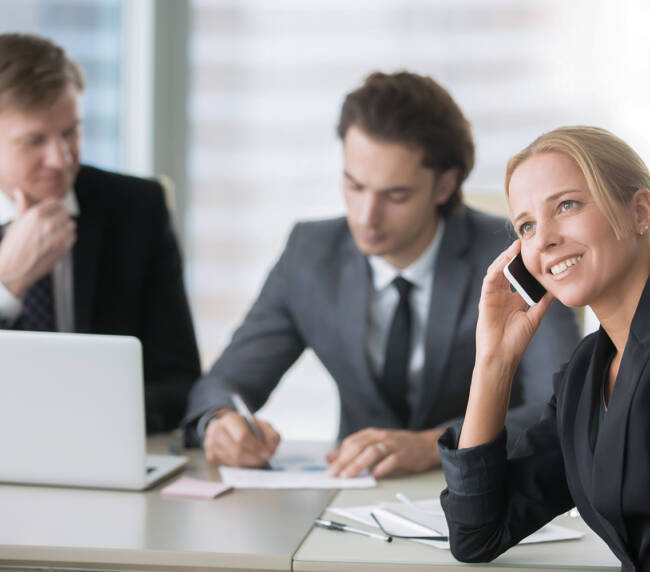 group of businessmen at the modern office desk with computer