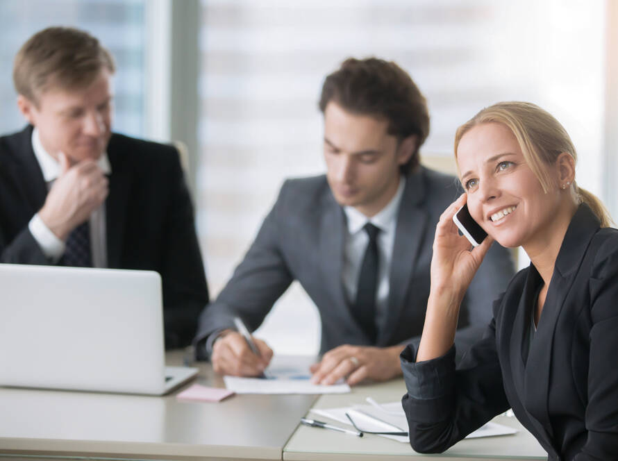 group of businessmen at the modern office desk with computer